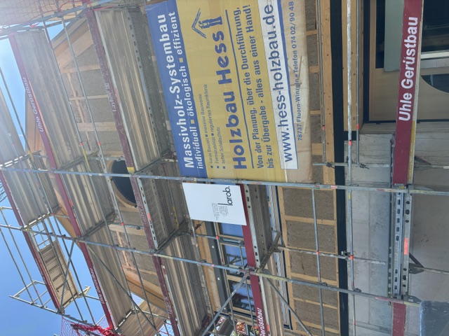 Ökologischer Holzbau Stuttgart – Baustellenbanner Holzbau Hess